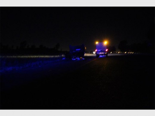 The red Toyota RunX was found on its roof after overturning on the R41.